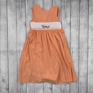 Orange gingham smocked dress